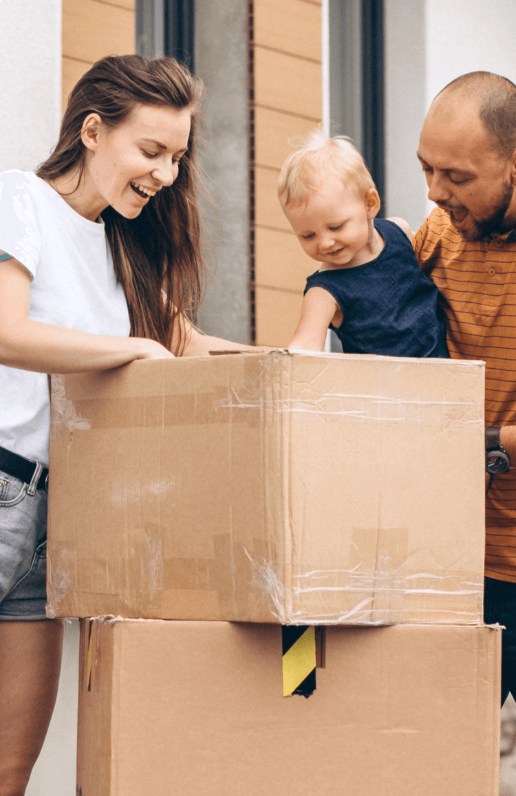 Young family with little daughter moving into new house